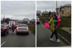 Агресивна жінка з дитиною на руках ледь не влаштувала ДТП та впустила доньку на землю (Відео моменту)