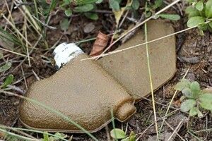 росіяни залишають розтяжки у пральних машинках