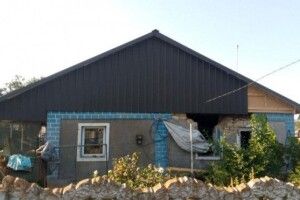 У селі на Херсонщині волиняни почали робити фасади пошкоджених під час окупації будинків