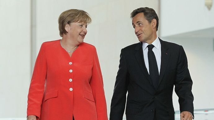 Меркель і Саркозі: скільки вони підлизували путіну... Фото із сайту gettyimages.com.
