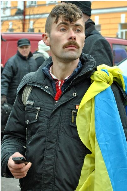 Олекса́ндр Анато́лійович Капіно́с (псевдо «Кремінь») загинув на Євромайдані під час зіткнень на вулиці Грушевського 19 лютого 2014 року. Герой України посмертно…Фото: uk.wikipedia.org.